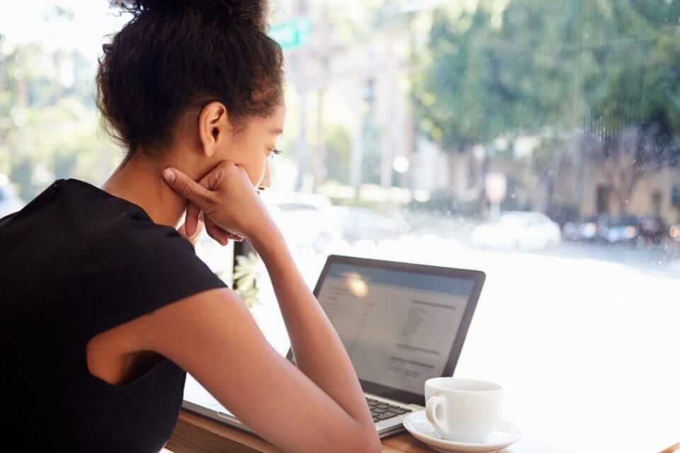 Person shopping insurance on computer